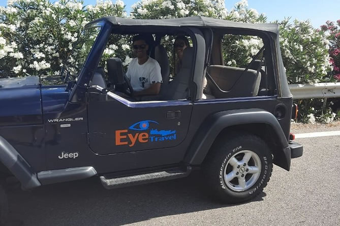 Blue Jeep Wrangler with Eye Travel logo during a Crete jeep safari