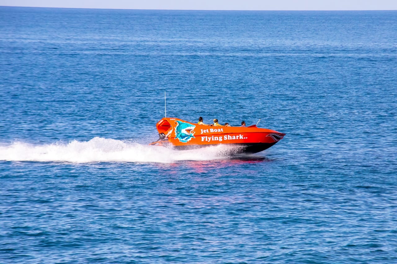Passengers enjoying a jet boat tour near the Hersonissos coastline